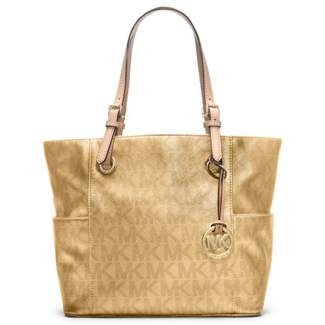 michael kors bag strike gold|Michael Kors gold shoulder bag.